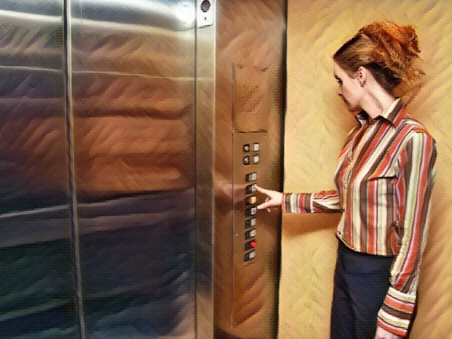 woman pushing buttons of an elevator