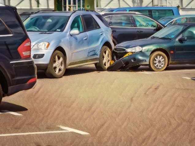 Car accident in the parking lot.