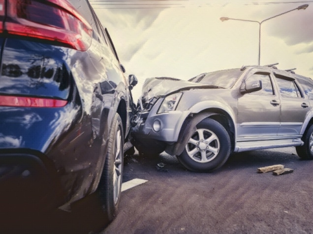 . SUV car crashing beside another one on the road