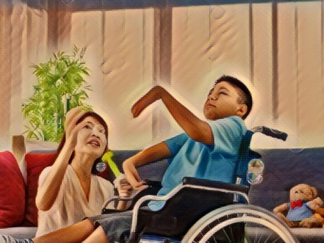 asian woman playing with disabled child on wheelchair by bubble maker in living room of the house.