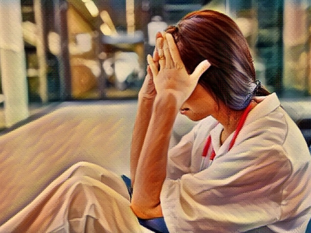 Exhausted nurse or medicine student with burnout due to congestion