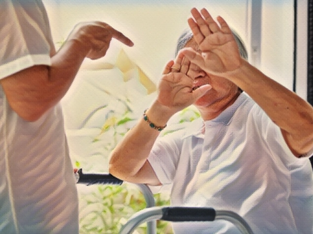 Asian elderly woman were physically abused, attacking in house, angry man raised punishment fist. Signs of Nursing Home Neglect concept