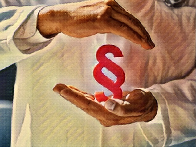 doctor with stethoscope holding section sign