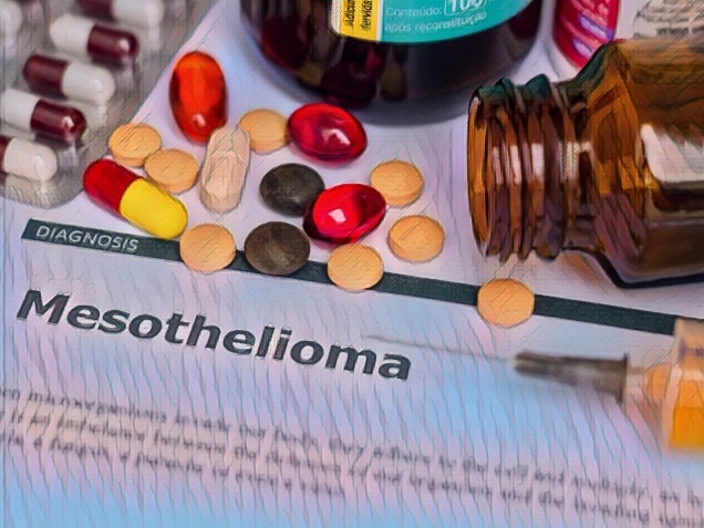 Mesothelioma - Diagnosis printed on white paper with medication, injection, syringe and pills