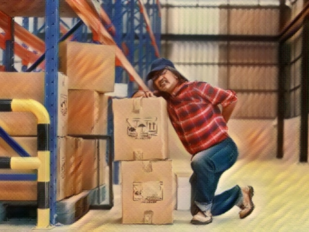 Asian worker man hurt his back lift heavy box in factory