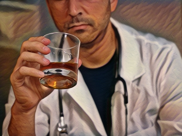 Doctor drinking glass of scotch at the end of a long day
