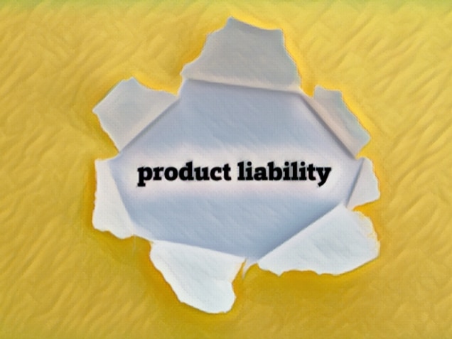 PRODUCT LIABILITY word written under torn paper.