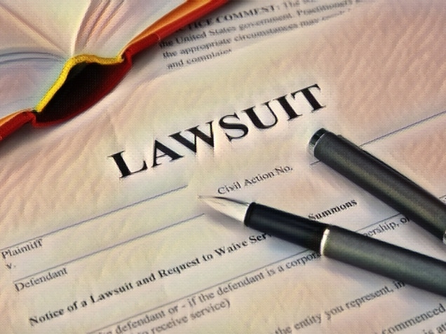 lawsuit form with filler and book