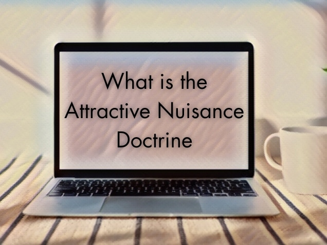 a laptop on a desk with words what is the attractive nuisance doctrine on the screen
