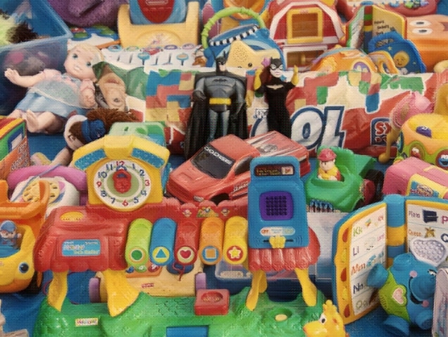 A pile of plastic, used toys. Concept of dangerous and defective children's products