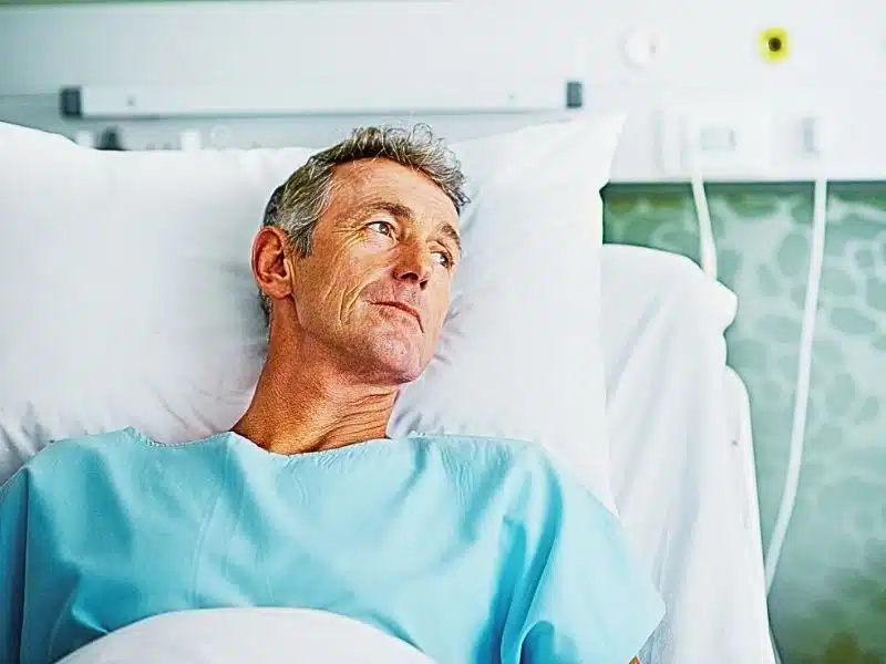 Shot of a sick man lying in a hospital bed What to Do if You Suspect Medical Malpractice
