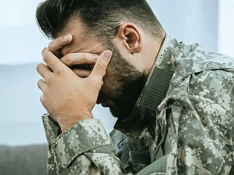 Side view of depressed man. Who Is Eligible for the Camp Lejeune Lawsuit?